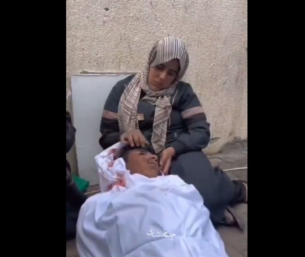 Video: A bereaved mother in Gaza bids final farewell to her son, murdered by Israeli airstrikes