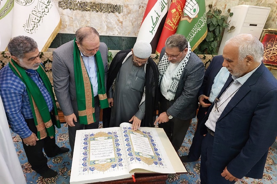 Iranian calligrapher bestows handwritten Quran to Imam Hussein shrine