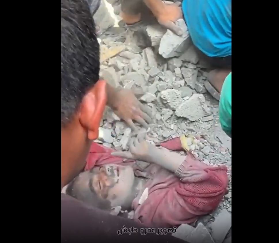 Video: A girl just pulled out alive in Khan Yunis, S Gaza after Israeli airstrikes this morning
