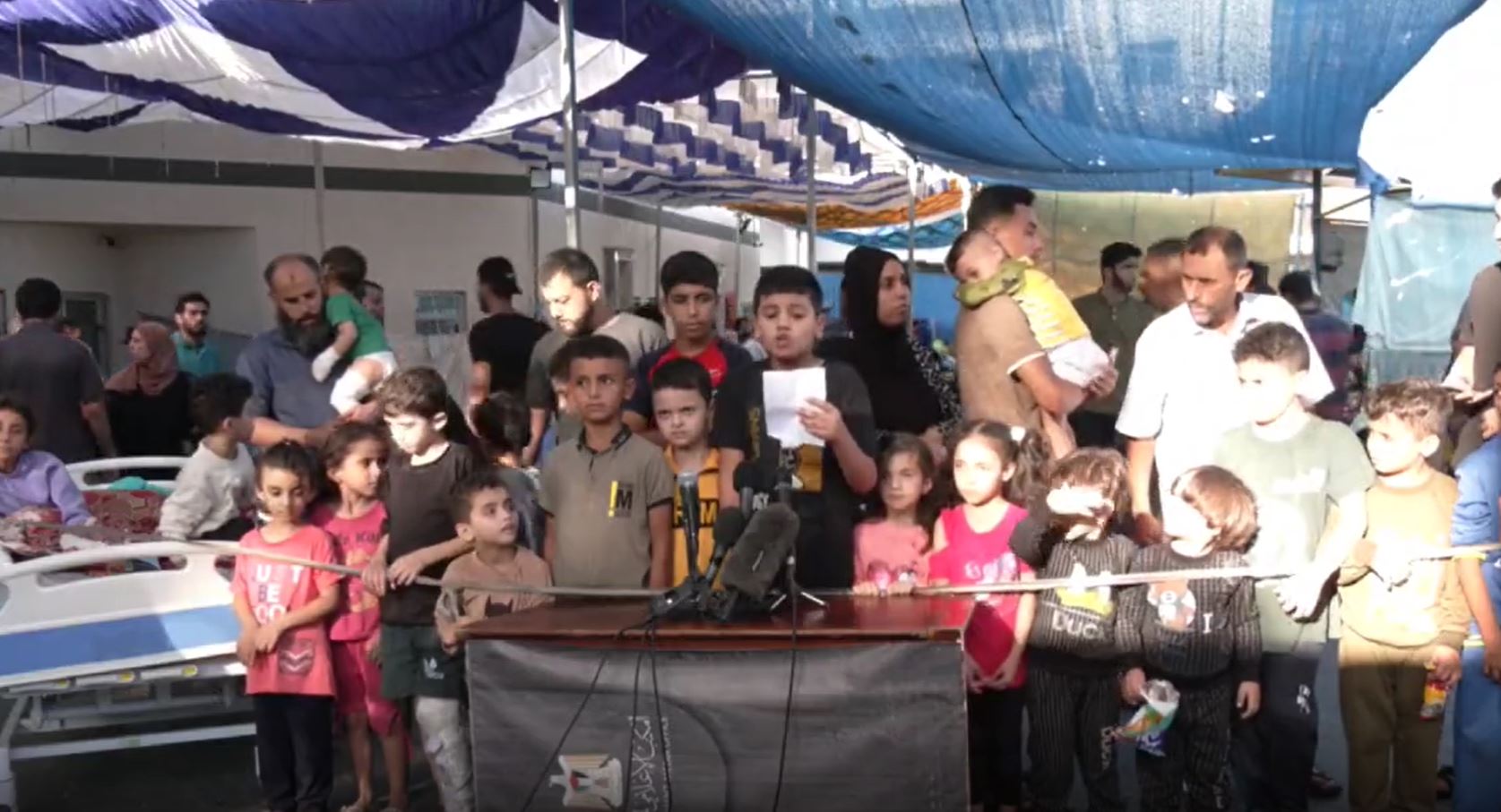 Video: Palestinian children organize press conference in Al-Shifa hospital to tell world about Gaza situation