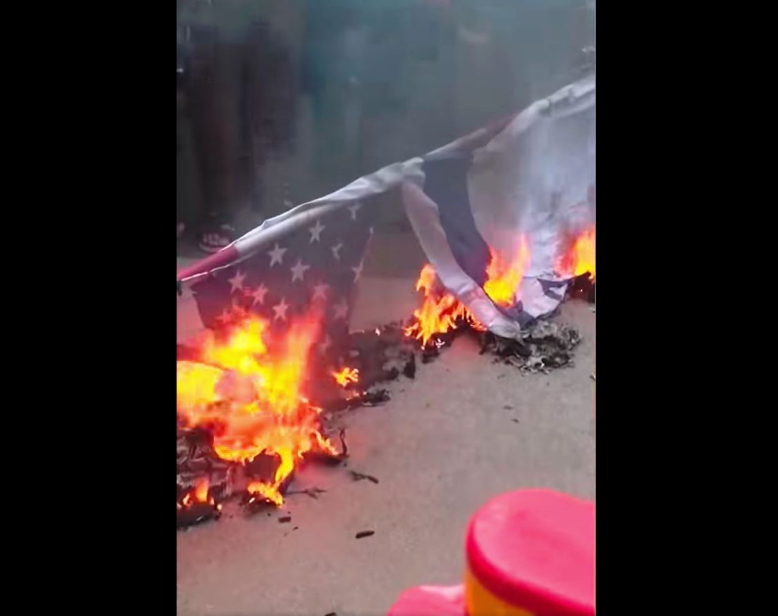 Video: Pro-Palestinian supporters set fire to US and Israeli flags outside US embassy in Jakarta, Indonesia