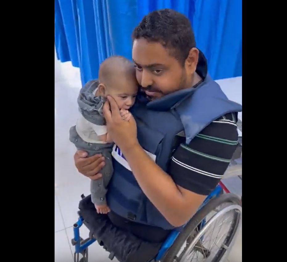 Video: Palestinian journalist who lost legs in Israeli aggression, try to calm baby who pulled alive from rubble