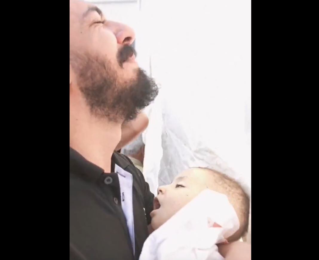 Video: No words can describe a father loss his child! #Gaza_under_attack