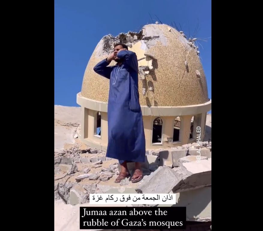 Video: A Palestinian in Gaza performs Adhan above rubble of a mosque destroyed by Israeli airstrikes
