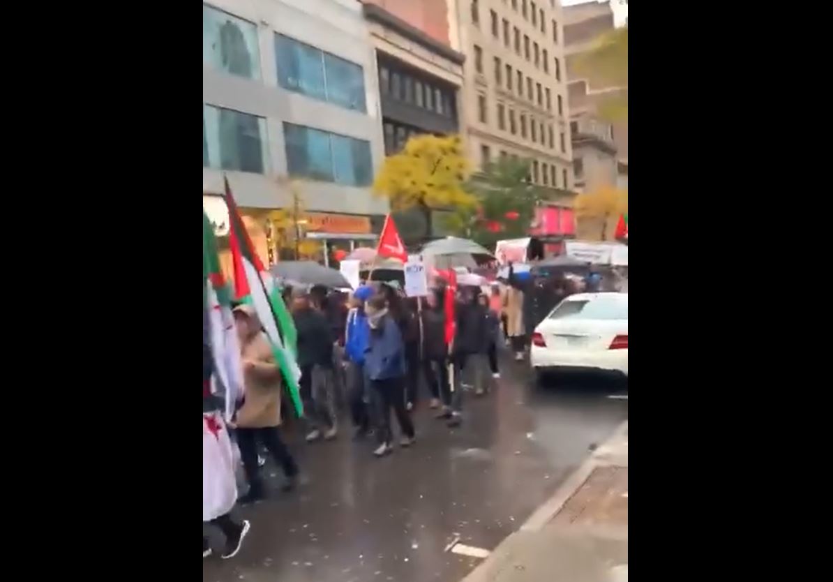 Despite cold weather & rain; massive march in Montreal, Canada against PM's support of Israeli genocide 