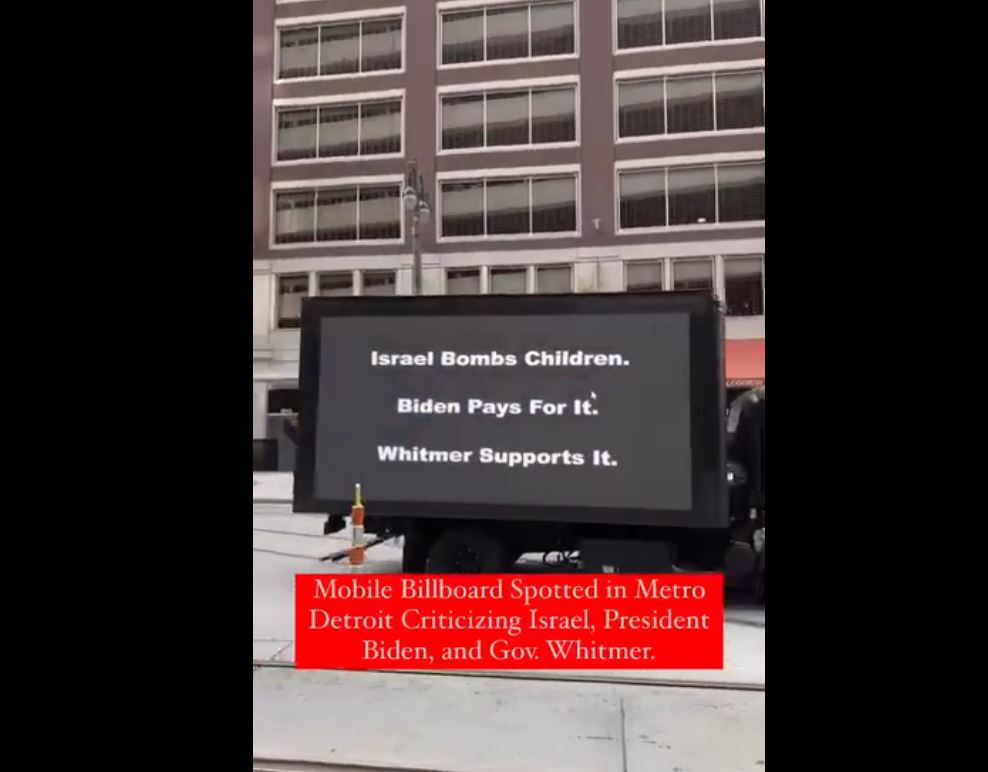 A truck in Detroit, US with words: Israel bomb children, Biden pay for it, Whitmer supports it
