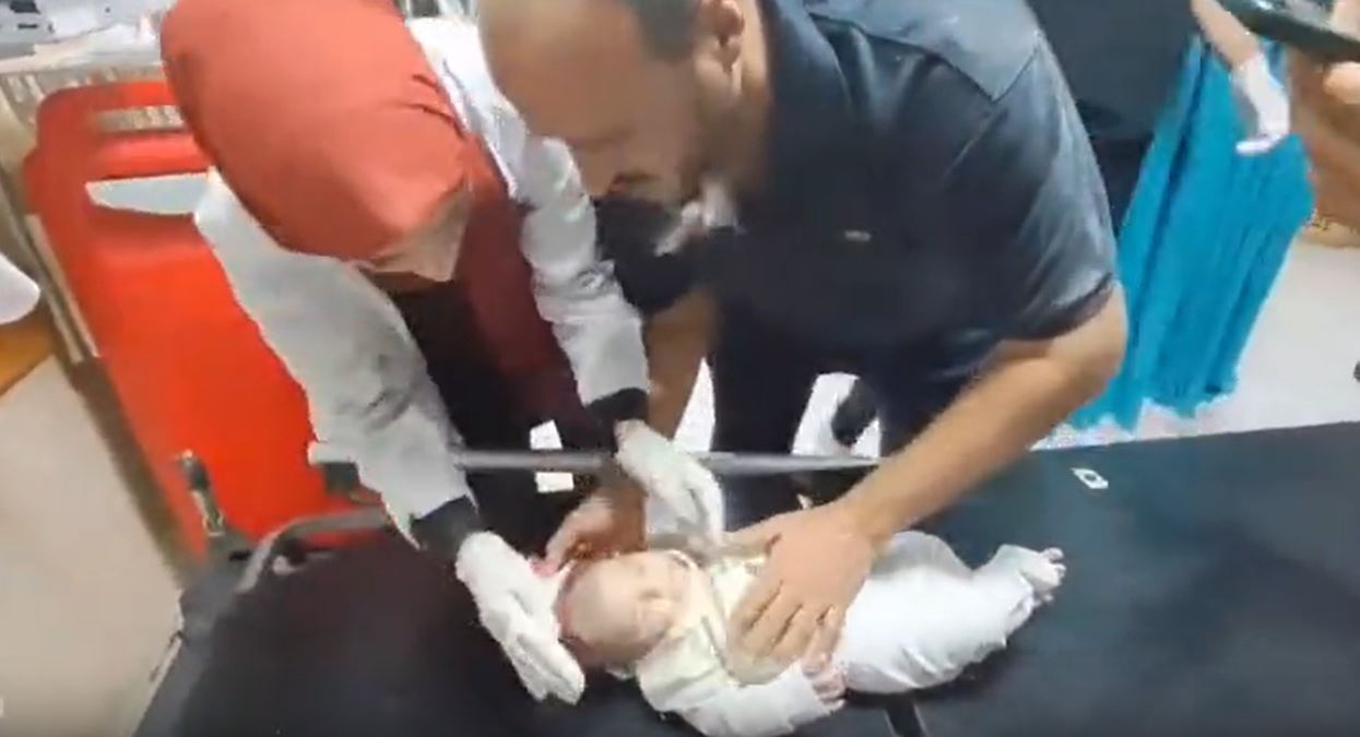 Video: A Palestinian baby pulled out alive from rubble this morning after Israeli airstrikes in Gaza