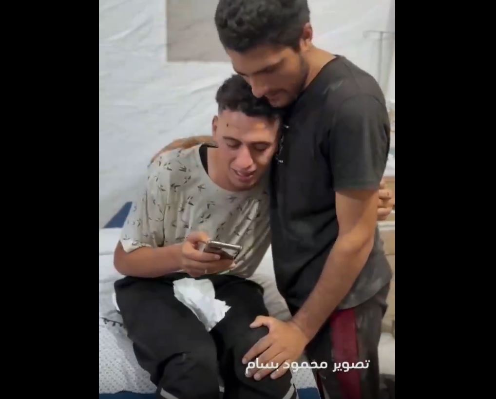 Video: Wounded Palestinian youth recites Quran after his family massacred in Israeli airstrikes this morning
