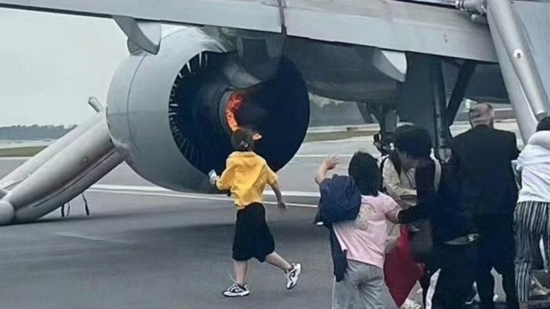  一架从中国飞机在新加坡紧急降落 造成9 名受伤