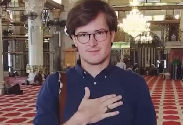 Video: German photographer describes significance of Arbaeen, Ashura procession in Karbala 