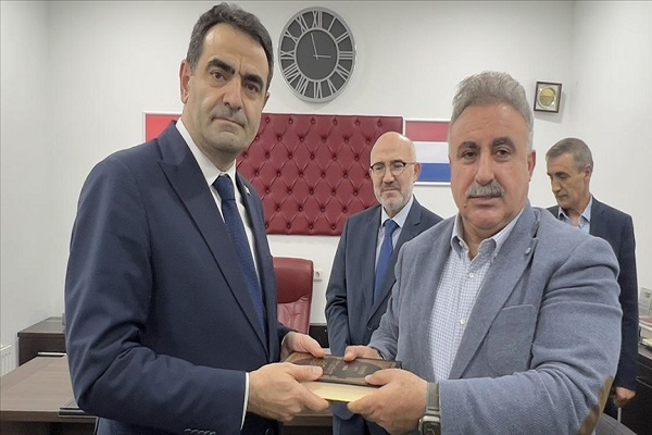 Quran copy desecrated in Netherlands repaired, given to Turkish envoy