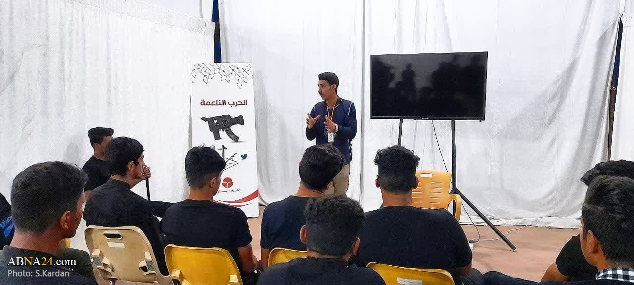 فيديو | موكب "الشباب الرسالي" یقدم خدمة ثقافية للزائرين في مشاية الأربعين 