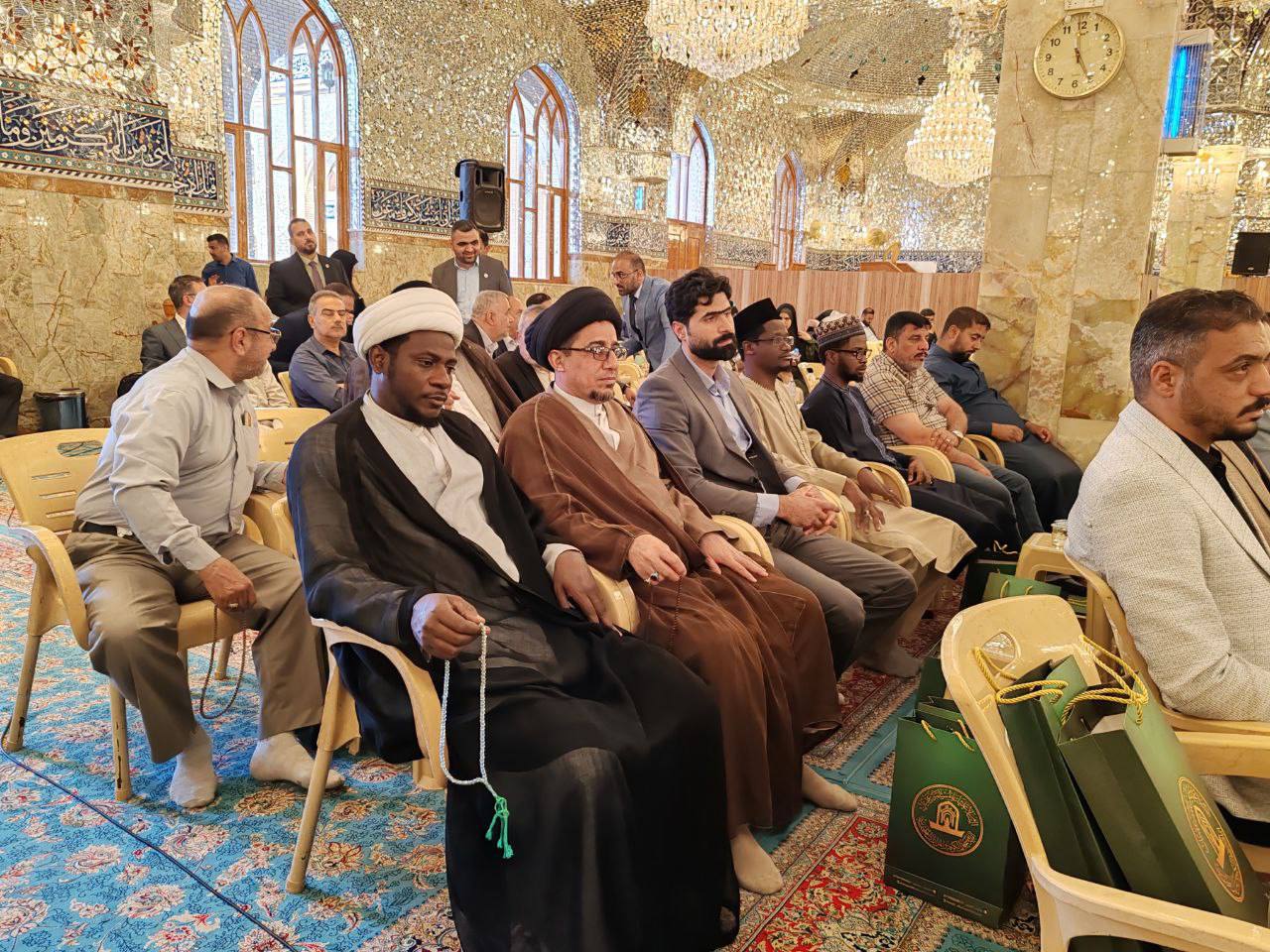 جاليات افريقية شيعية تشارك بافتتاح مهرجان السفير الدولي(13) في مسجد الكوفة+(صور)