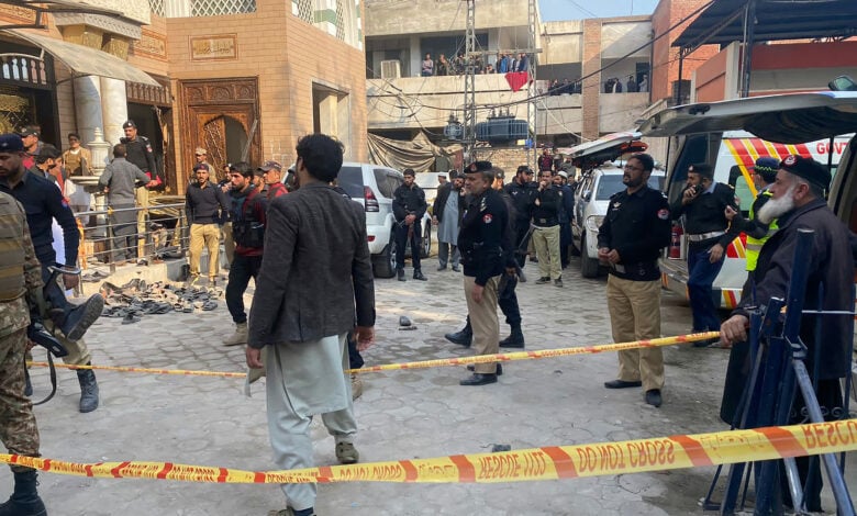One police officer killed, 6 others wounded in grenade attack at mosque in southwestern Pakistan