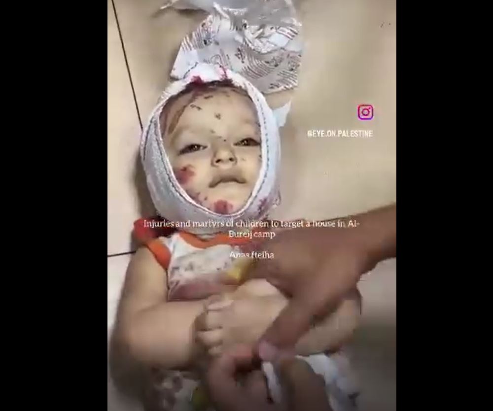 Video: A Palestinian baby martyred in a violent Israeli airstrike on Al-Bureij refugee camp, central Gaza