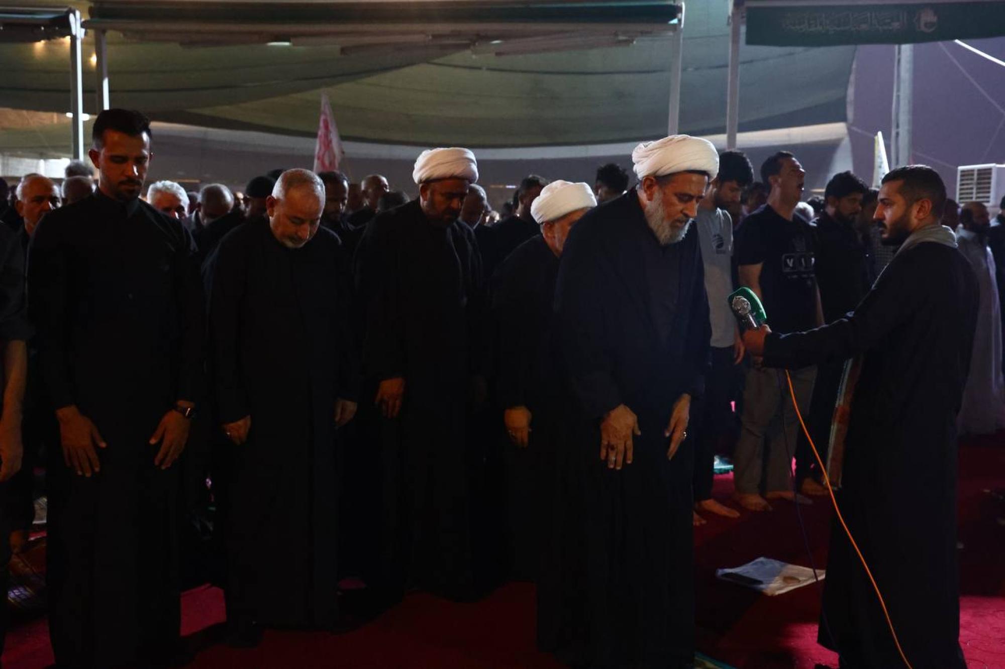 Establishment of longest unified congregational prayer for Arbaeen visitors extended on “Ya Hussain” road (+Photos)