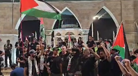 Slogan Peziarah Arbain Dukung Rakyat Tertindas Gaza di Rute Najaf - Karbala