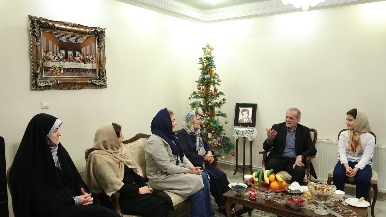 Iran President meets families of two Christian martyrs of Sacred Defense