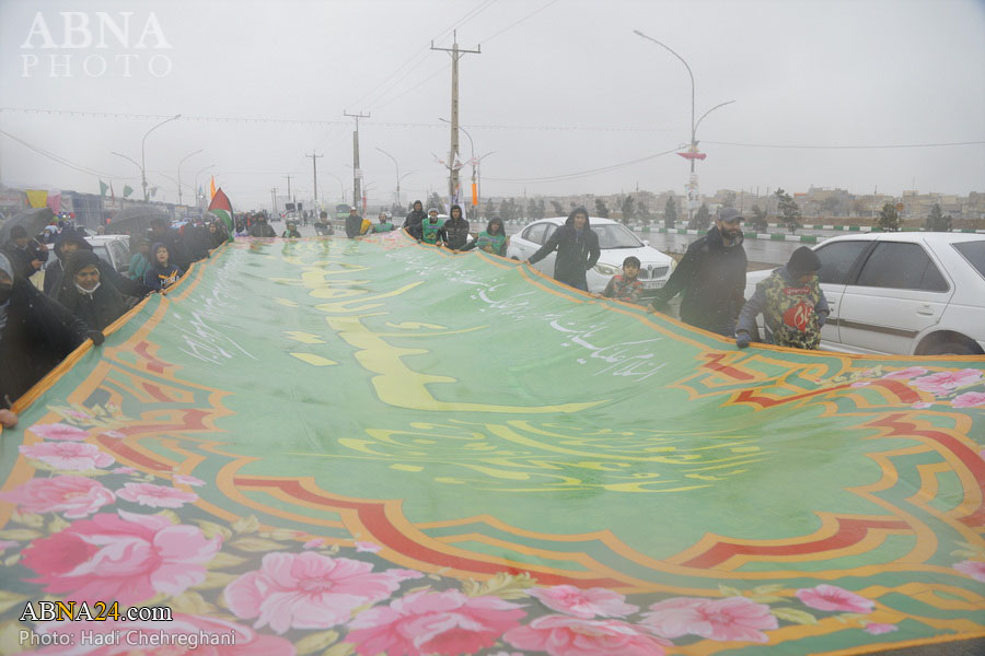 Photos (2): Pilgrims march toward Jamkaran Mosque in snowy weather