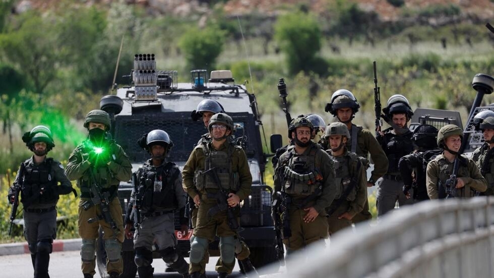 Cursed Zionists kills Palestinian at West Bank checkpoint