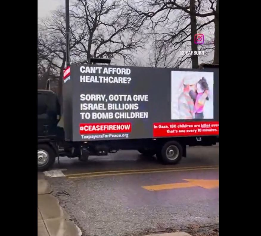 A truck with billboard in Michigan: "Sorry gotta give Israel billions to bomb Gaza children"