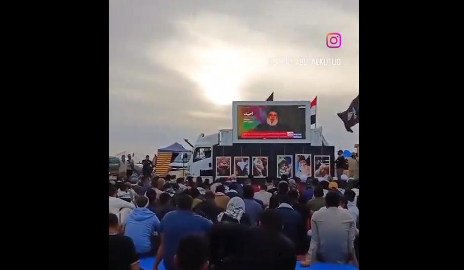 فيديو | محبو السيد "نصر الله" يتابعون خطابه عبر شاشة بين الحدود العراقية - الأردنية