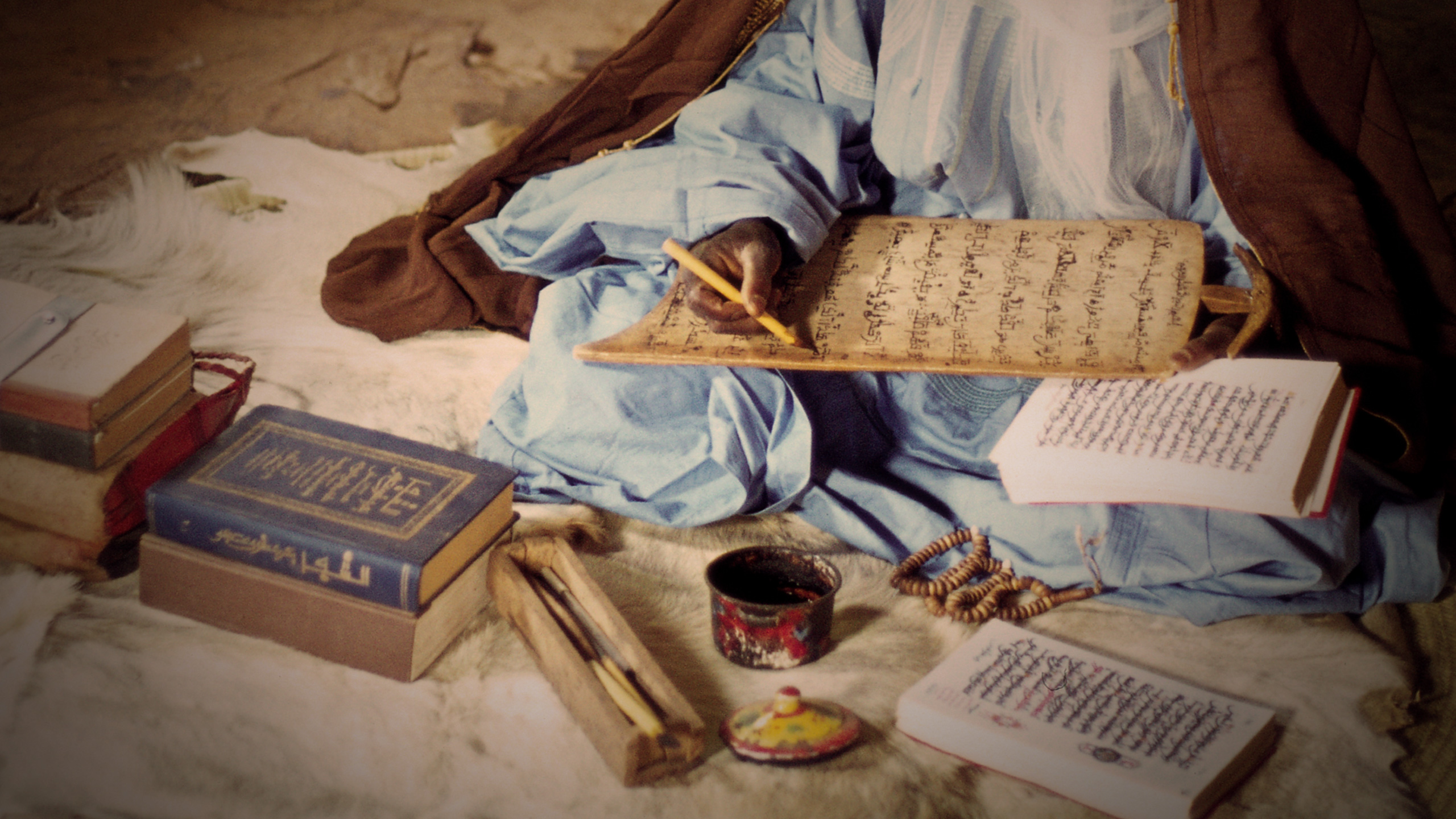 How was the Holy Quran compiled?