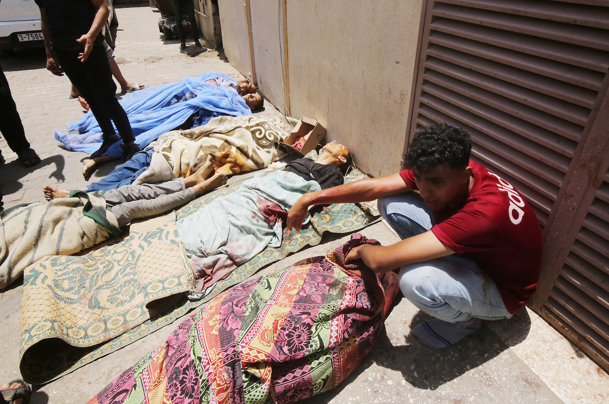 Death toll from Israeli massacre in central Gaza rose to 274