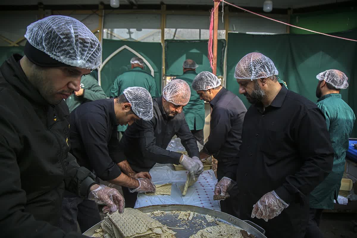 Qom Holy Shrine pilgrims served votive food on Hazrat Zahra martyrdom anniversary