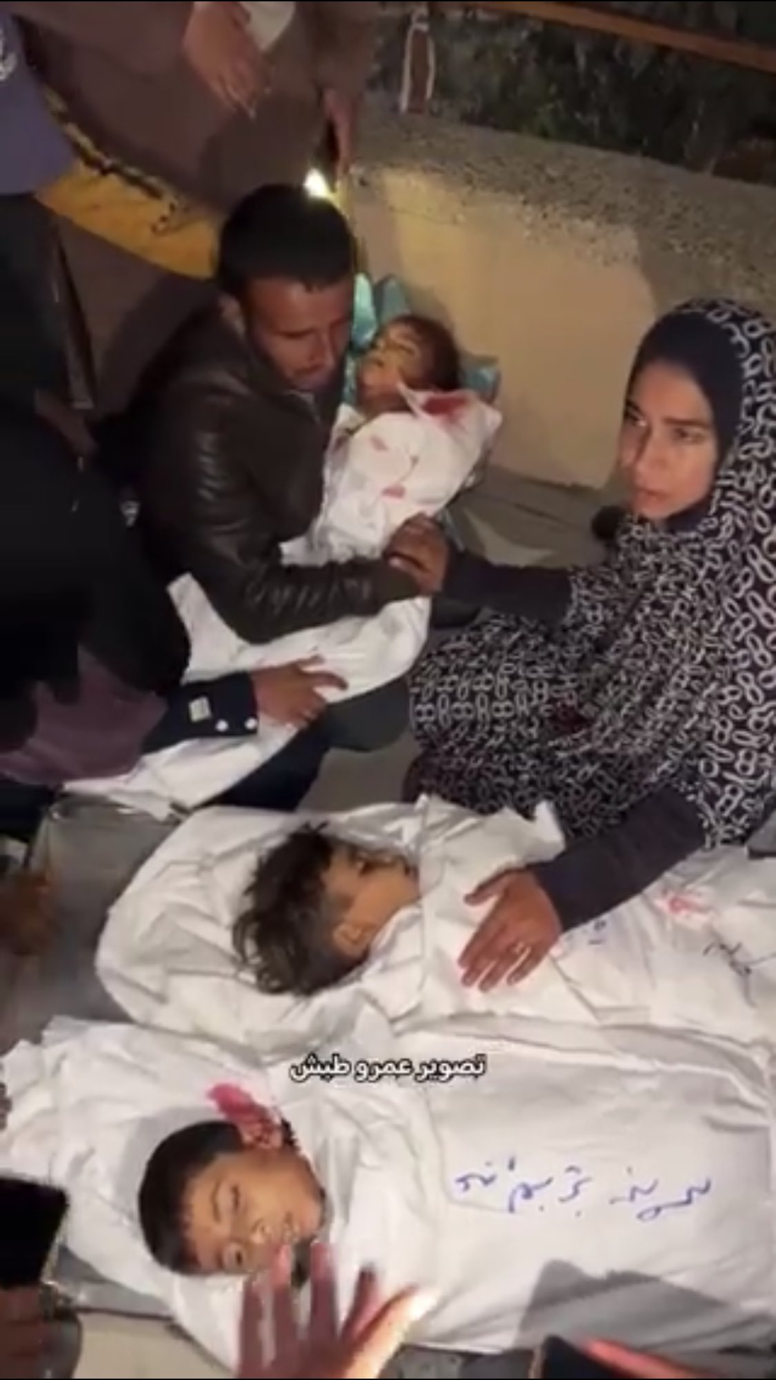 +3 Videos / Photos: Grieving Palestinian parents send off their three children martyred in Al-Mawasi, south Gaza