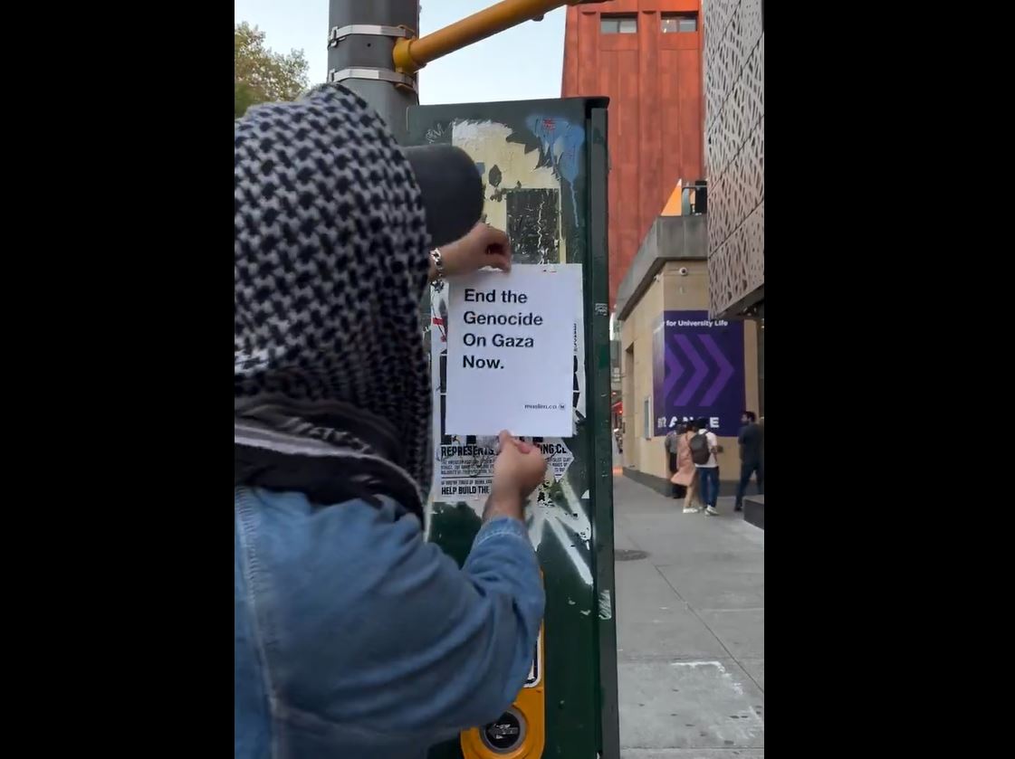 Video: Pro-Palestine activists stamped a sticker reading “End the Genocide on Gaza Now,” around New York 