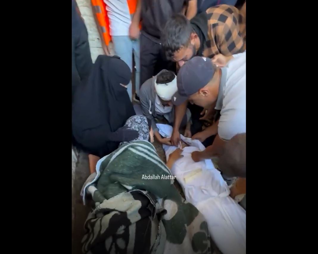 Video: A wounded Palestinian mother bids sad farewell to her son martyred in Israeli airstrikes in Gaza