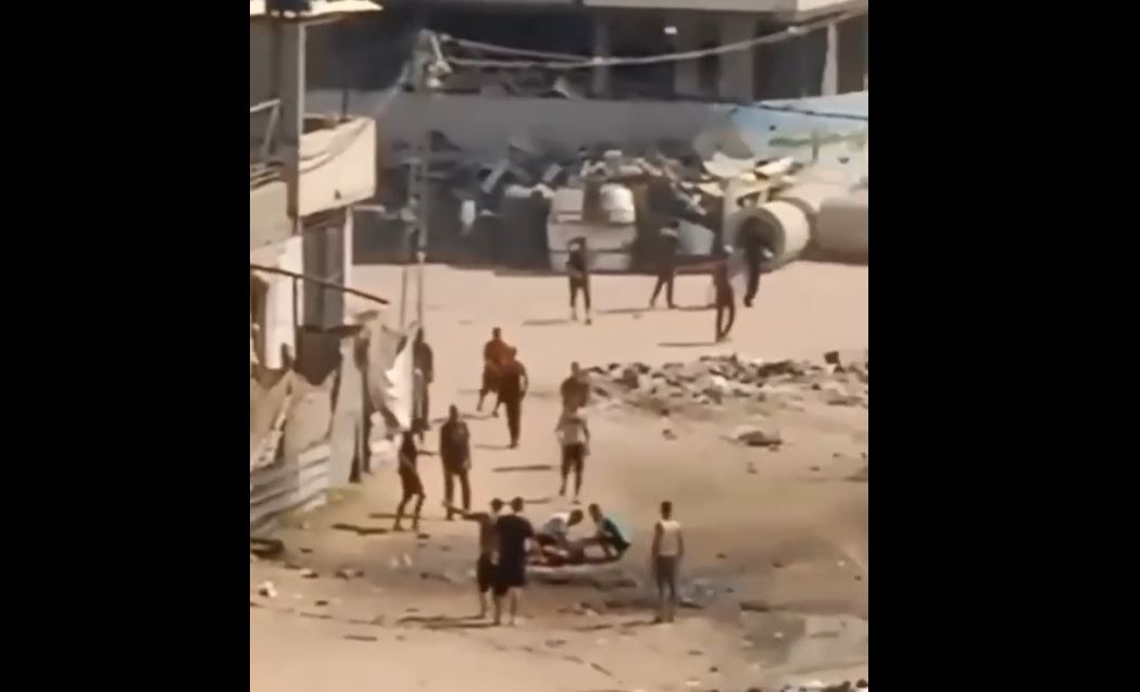 Video: Moment Israeli occupation aircraft directly targeted Palestinian civilians trying to rescue a child in north Gaza