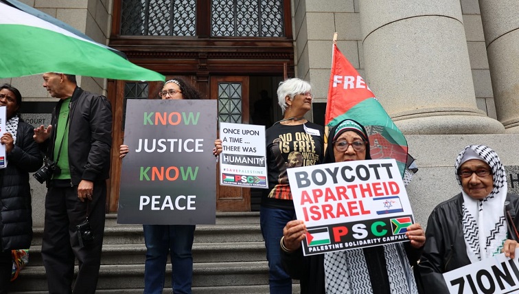 Pro-Palestine demonstrators gather in front of Cape Town High Court