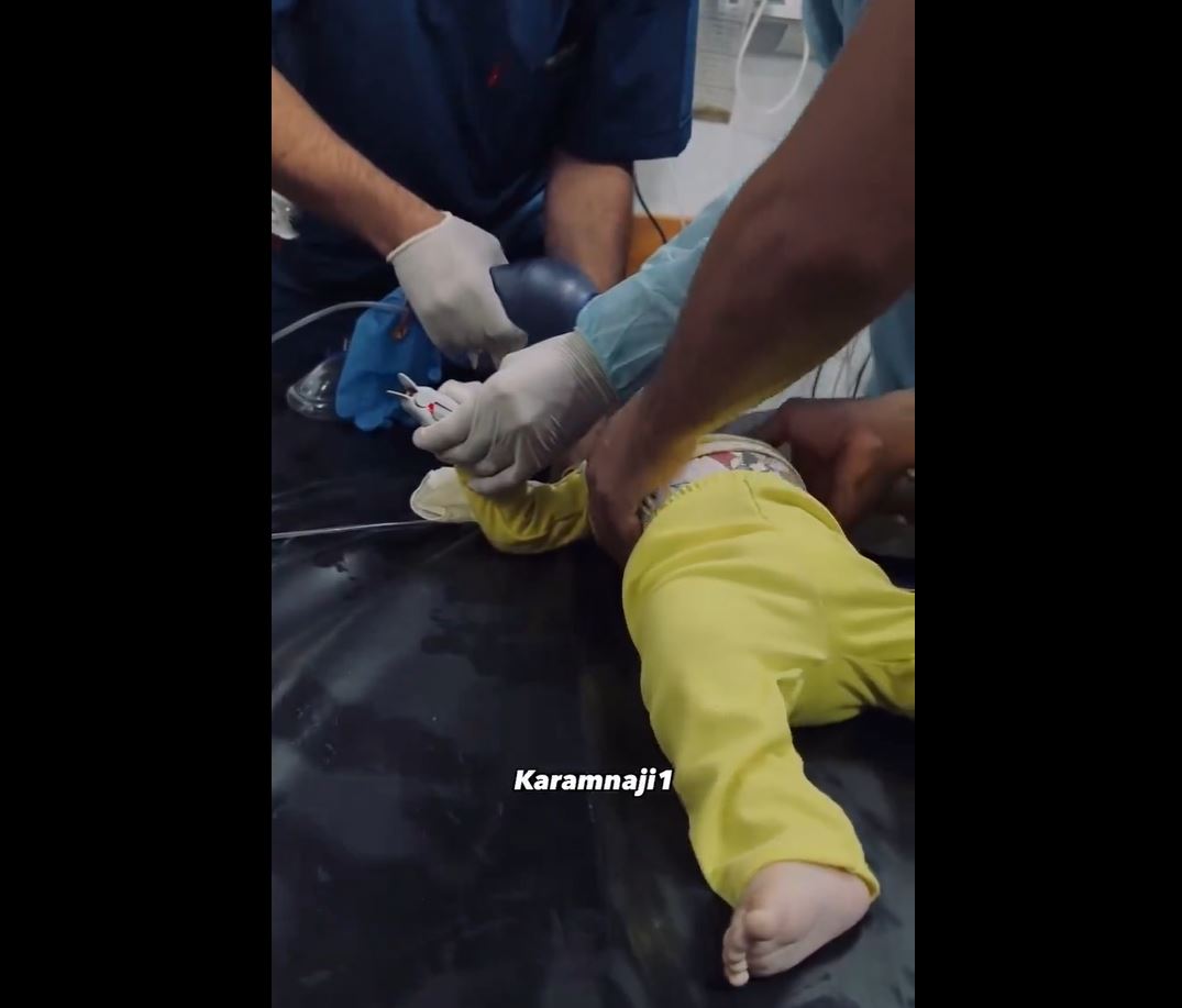Video: Palestinian Medics helplessly tried to revive a child martyred in Israeli bombing of northern Gaza