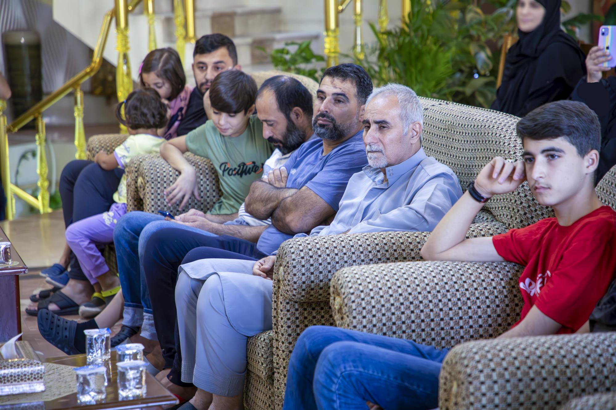 Secretary General of Al-Abbas Shrine meets with displaced Lebanese families to Karbala (+Photos)