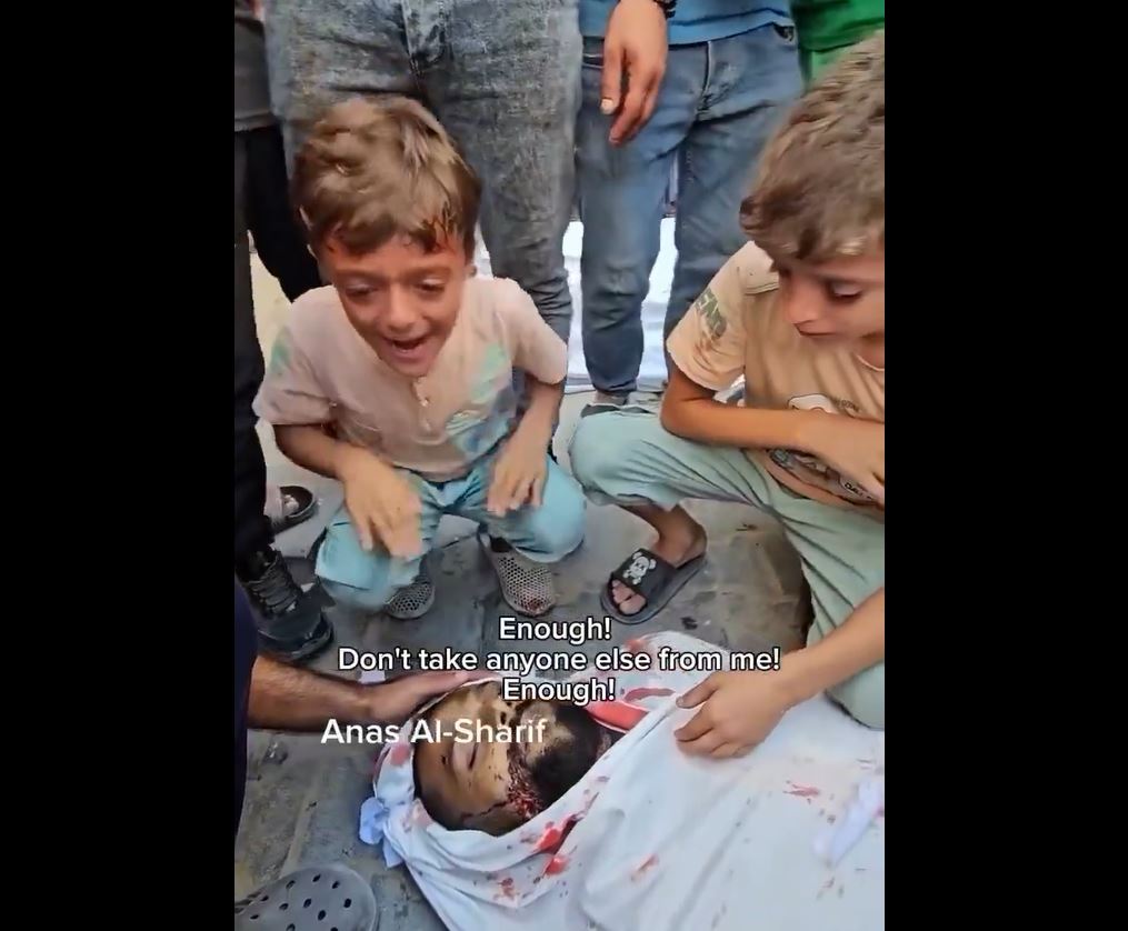 Video: Two Palestinian brothers bid a sad farewell to their father martyred in Israeli airstrike on Gaza