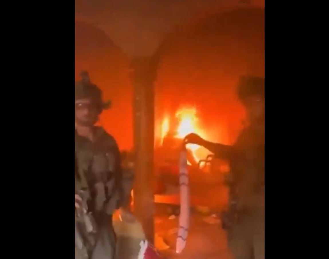 Video: An Israeli occupation soldier back to Rafah burning a Palestinian home to celebrate Jewish Holiday