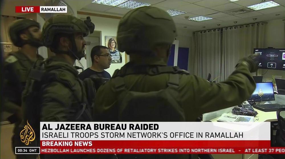  Israeli occupation forces raid, shutter Al Jazeera office in Ramallah 