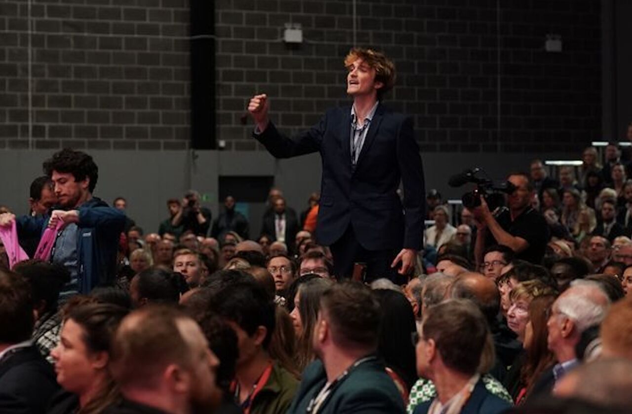 UK minister’s speech interrupted by pro-Palestine activists
