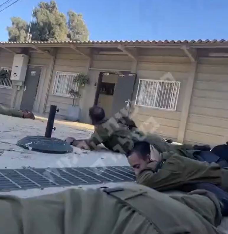 Video: Israeli soldiers take cover as air raid sirens heard during a rockets from Lebanon