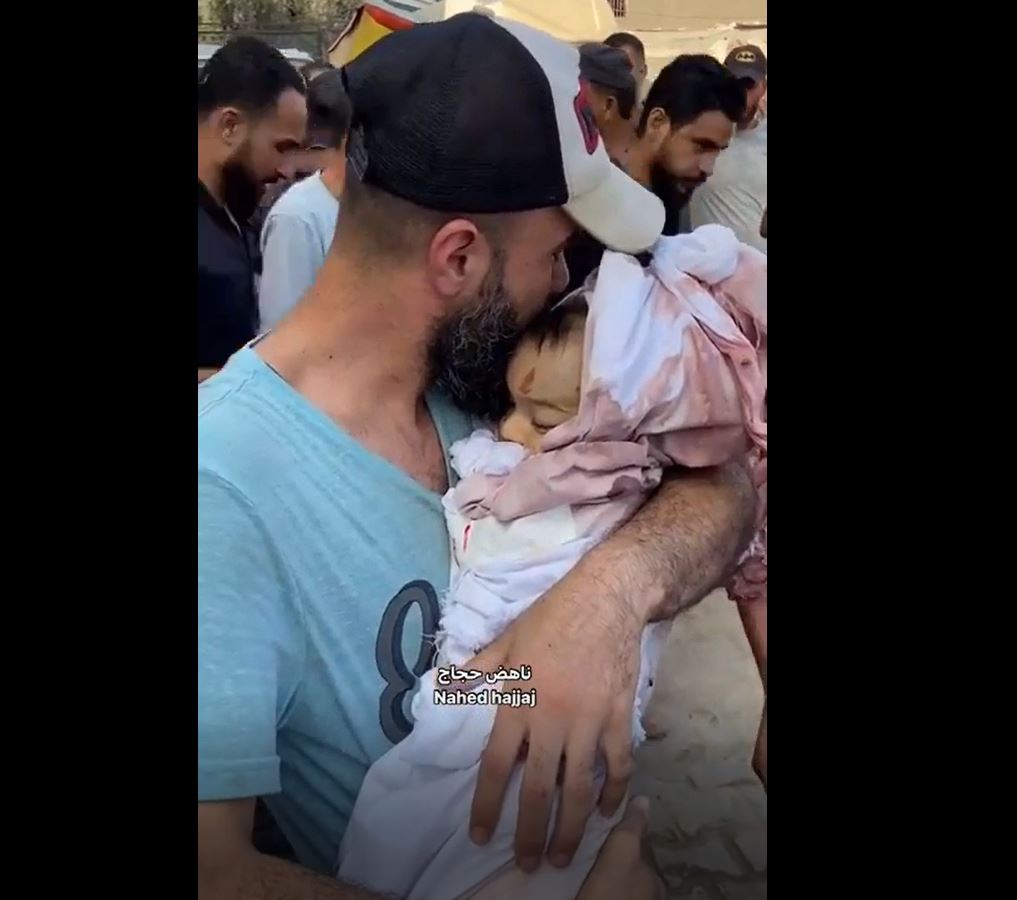 Video: Heartbroken Palestinian father embraces his daughter killed in Israeli bombardment in Gaza