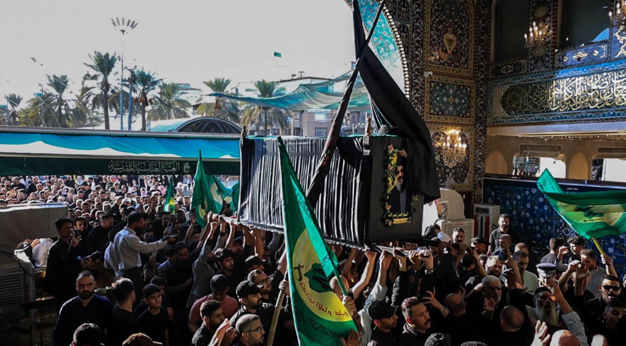 Funeral of symbolic coffin of martyr Hassan Nasrallah at Imam Hussain and Al-Abbas holy shrines / Photos