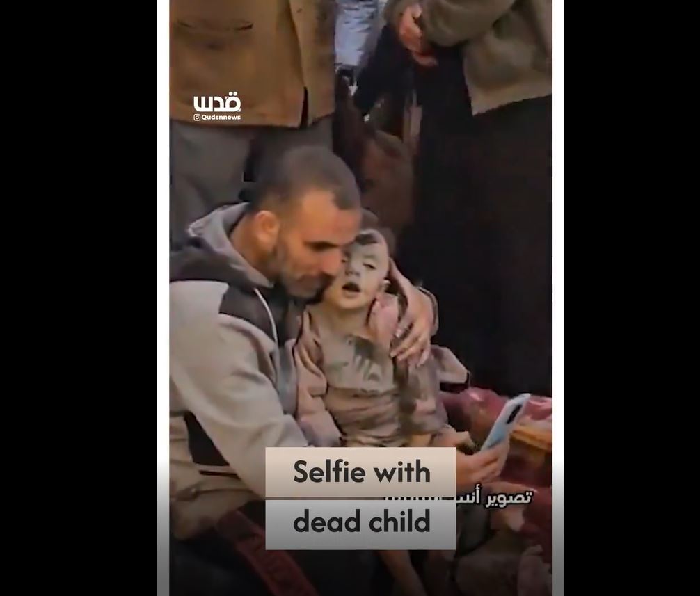 Video: Heartbroken Palestinian father embraces his martyred daughter and take last selfie with her