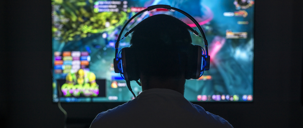 Does playing video games that have blasphemy and magic render a person non-Muslim?