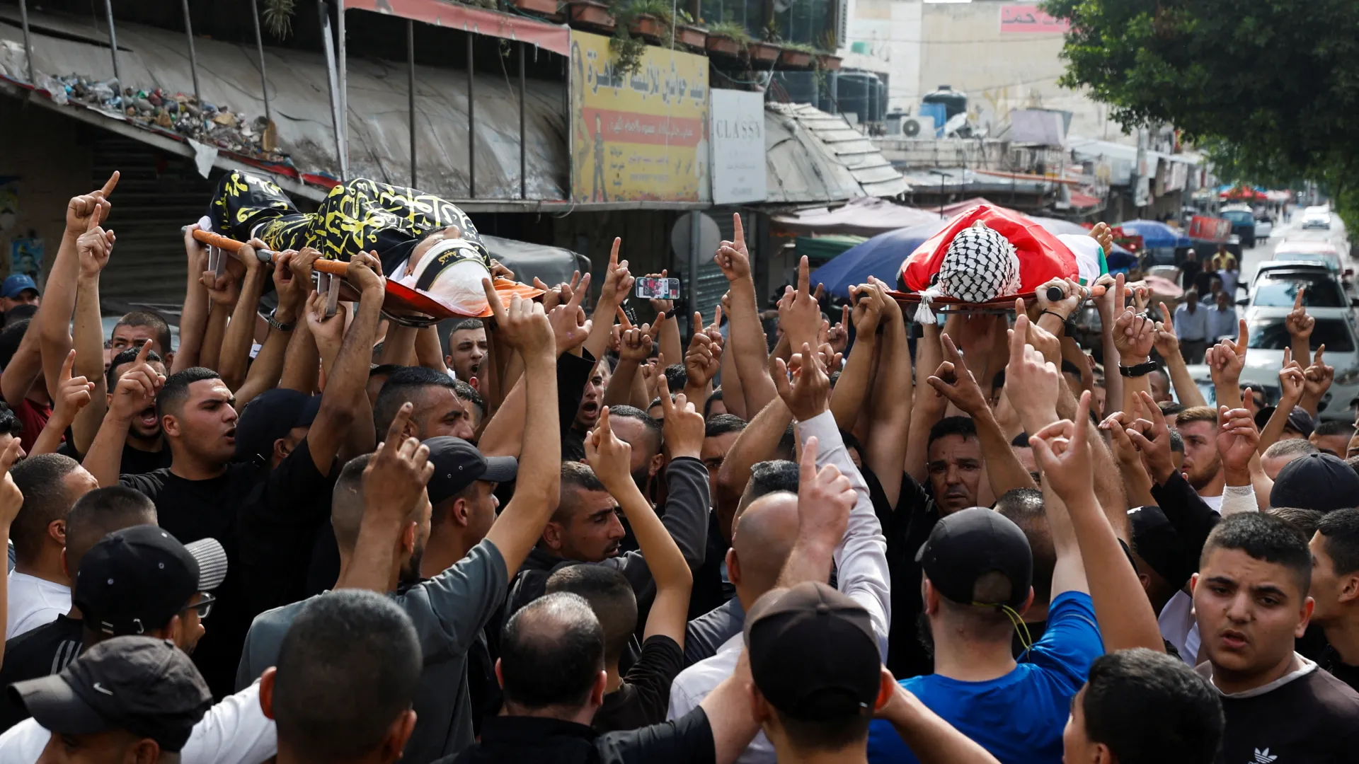 Thousands attend funeral of Palestinian fighters killed by Israeli forces in West Bank