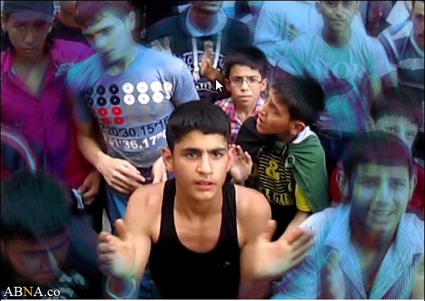 عکس/ اعدام وحشیانه نوجوان سوری مقابل چشمان خانواده وی(18+)