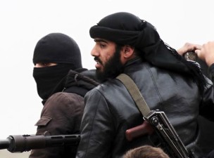 گروهک تروریستی "داعش" خلبان بالگرد سوری را ذبح کرد + عکس(18+)