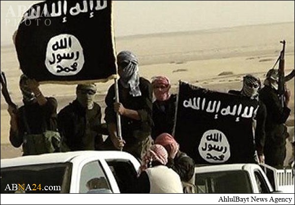 داعش یک جوان عراقی را به صلیب کشید + عکس