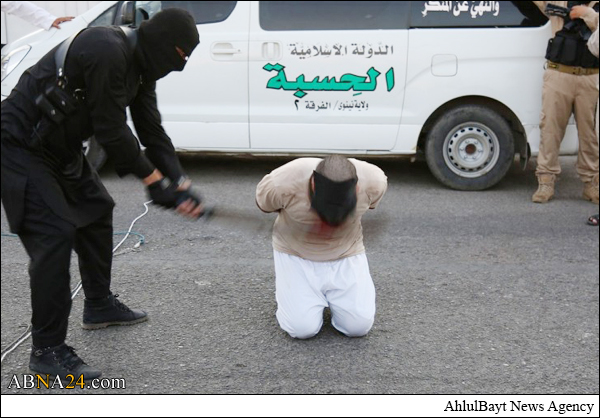 گردن زدن مرد موصلی به دست داعش + تصاویر